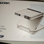 Aurzen ZIP Tri-Fold DLP Truly Mini Projector. Pocket Size. Zero-Lag Focus. One-Click Screen Mirroring. Full-Screen Mode. Type-C Fast Charging. 5.000mAh Battery. Indoor Outdoor Portable Projector.Gold